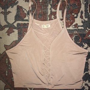 Medium. Tan sheer crop top